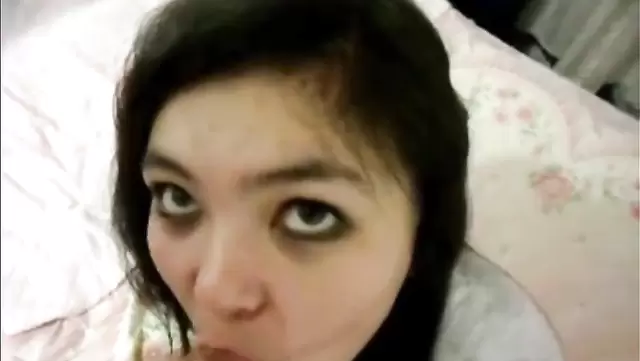 Pakistani girl with big eyes sucking